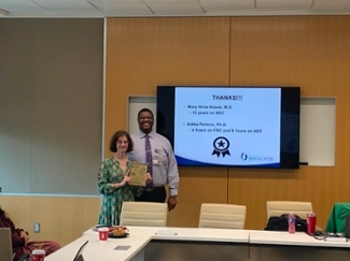 Dr. Demondes Haynes, Associate Dean for Admissions, thanks Dr. Mary Anne Kosek, for 13 years of service on the Admissions Executive Committee. 